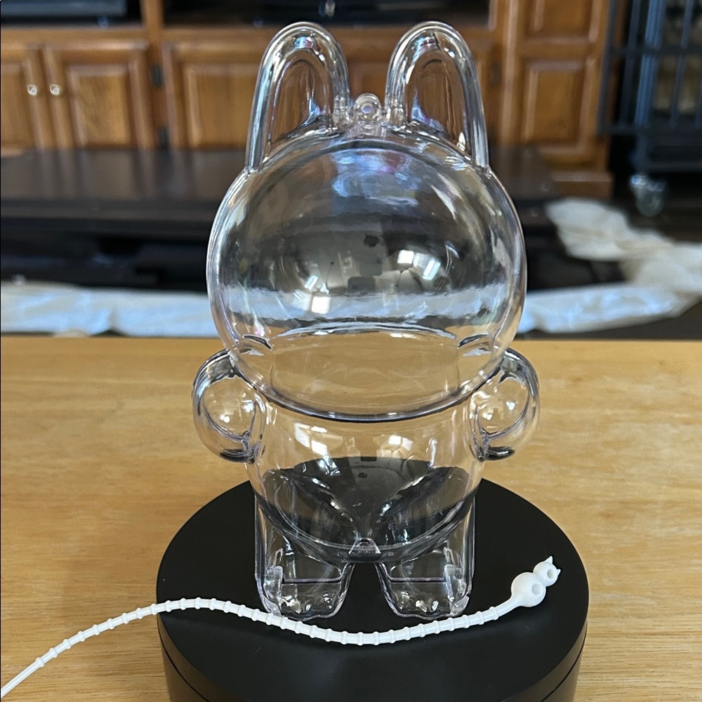 UNBRANDED (“LA-FOO-FOO”) 7” TALL STANDING CLEAR PROTECTOR CASE W/ TIE CLOSURE